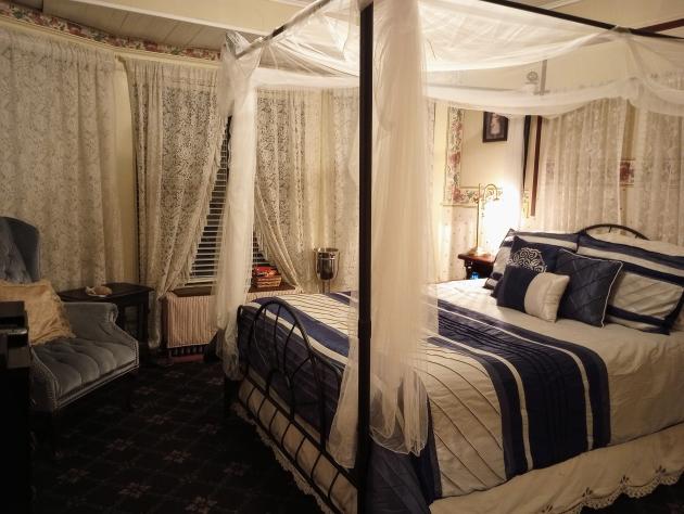 The Victorian Room with queen canopy bed & big bay window is a romantic option.