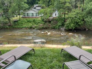 Hotels in Chimney Rock NC - The Carter Lodge Honeymoon Suite private riverfront 