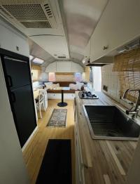Airstream Kitchen with minimal pot/s pan/s untencils cups,plates keurig coffee maker