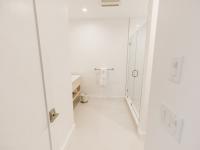 Image shows Bathroom with Glass shower doors