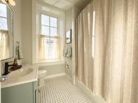 Private bath in Room 7, upstairs in Lanesboro MN with window and river views.