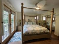 King bed, mirrored closet, French doors to lanai
