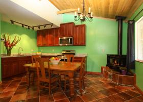 kitchen with dining table and firestove