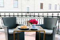 Relax on the New Orleans Style balcony in your own seating area